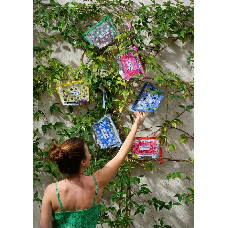 Trousse trasparente e impermeabile con chiusura zip, decorata con fiori blu